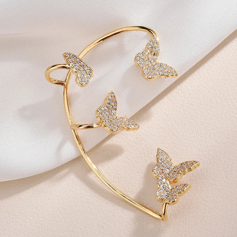 Sparkling butterfly-shaped ear cuffs with zircon stones, designed for fashionable jewelry without piercing