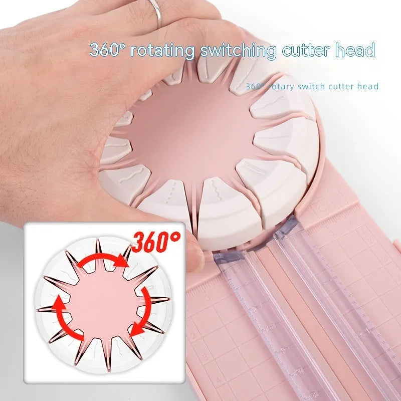 Pink and black 12-in-1 plastic dotted paper cutter on a white background.