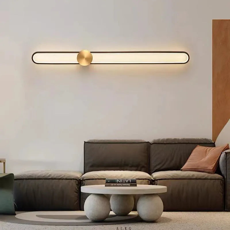 Round modern wall lamp with iron shade in gold or black finish options