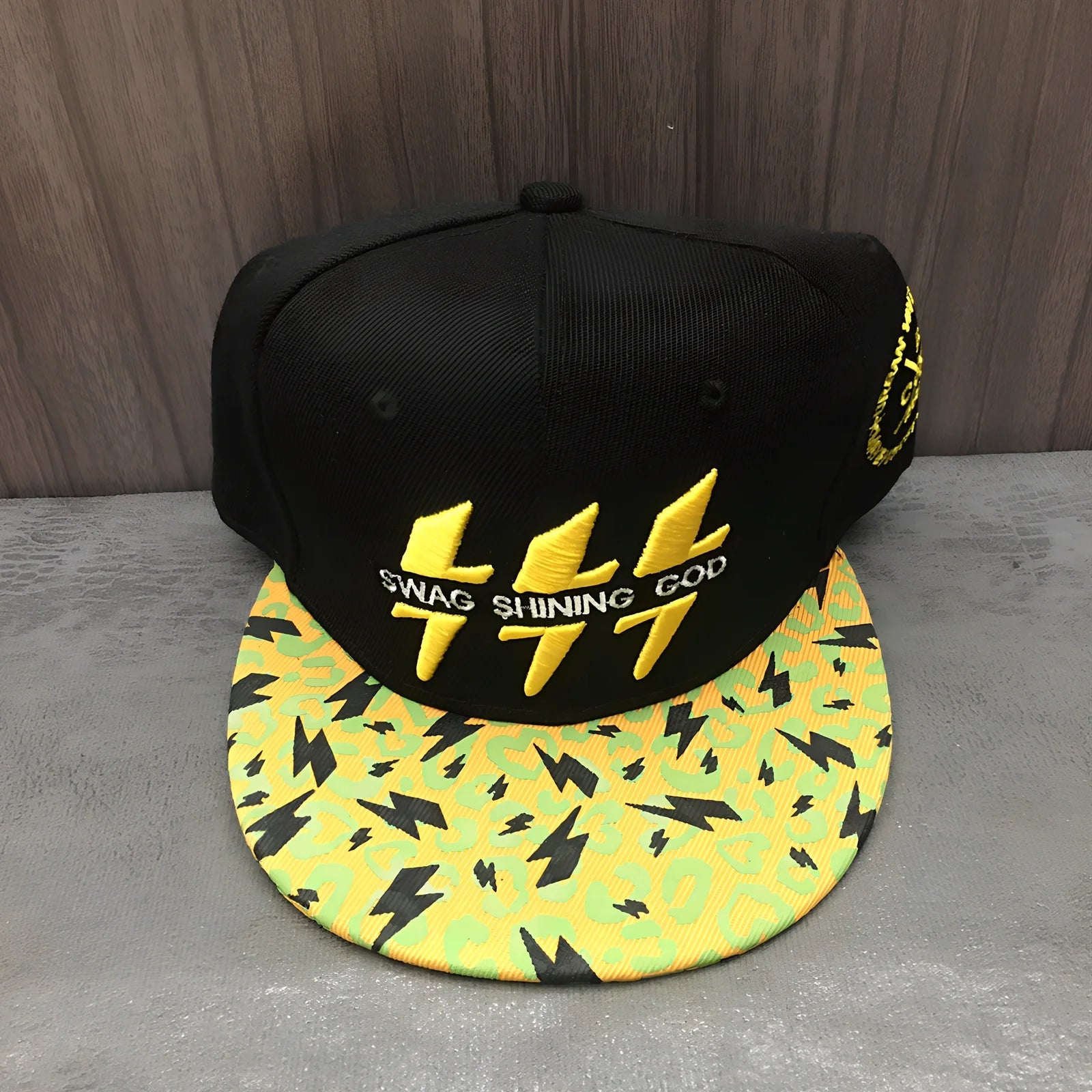 Korean-style baseball cap with satin weave striped pattern and adjustable back strap