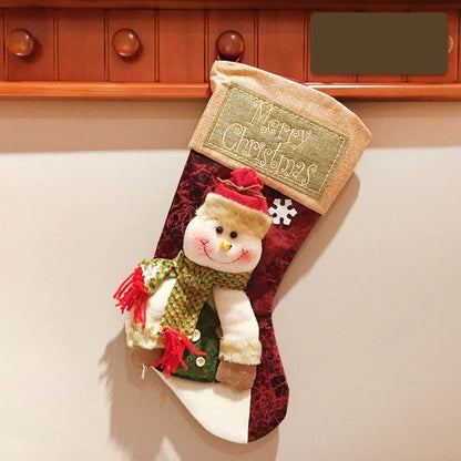 Cozy Christmas stocking with 3D applique designs of snowman, old man, and elk