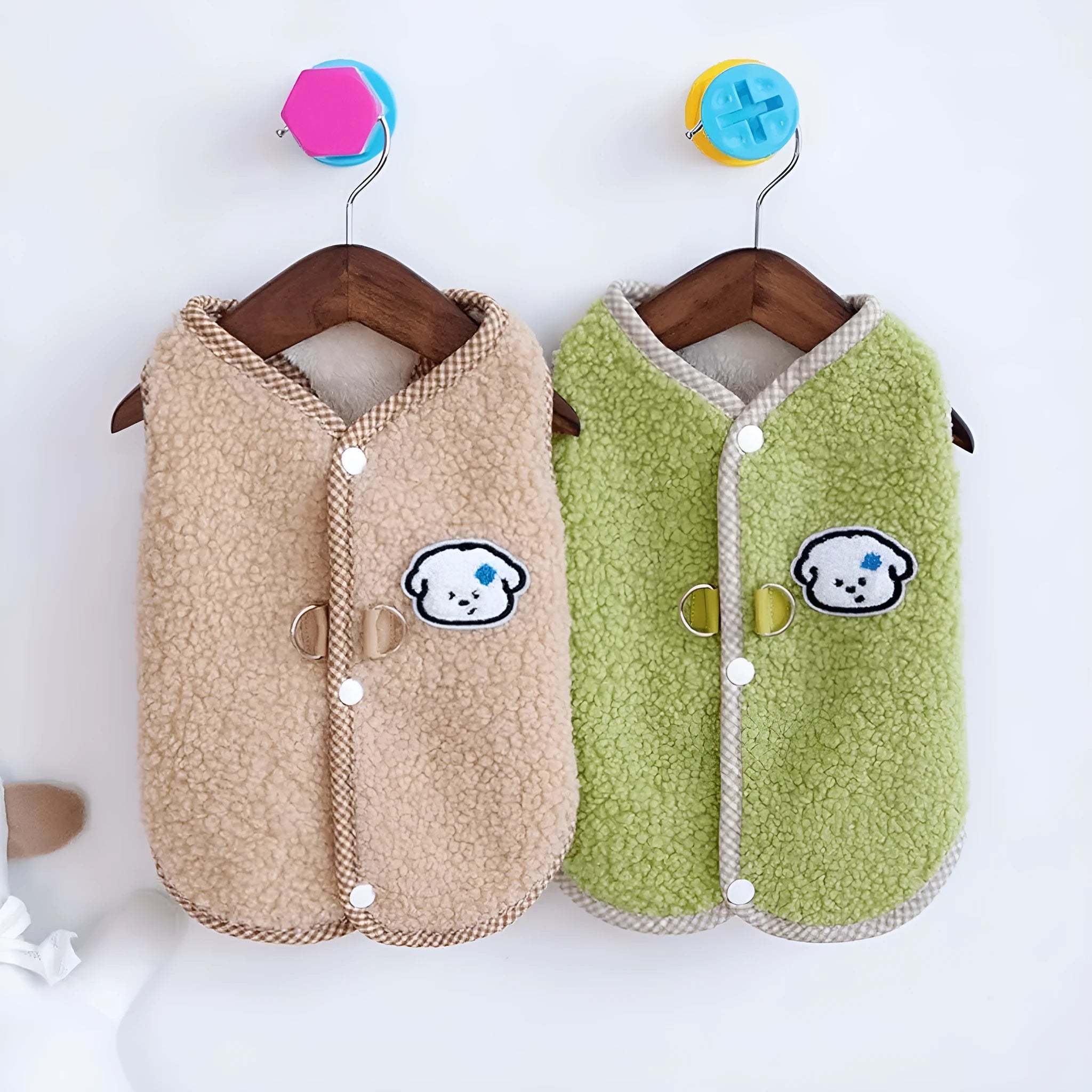 Green thickened coral fleece dog vest with leash ring on a small dog