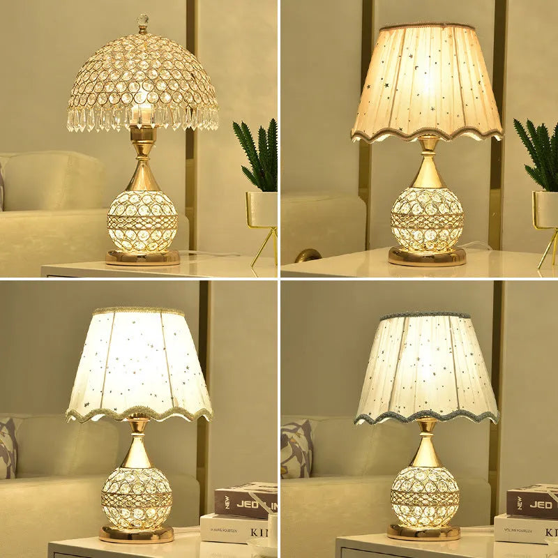 Gold crystal desk lamp with iron art base on wooden table