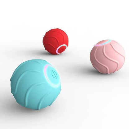 Automatic, self-bouncing cat toy balls in vibrant blue, red, and pink colors