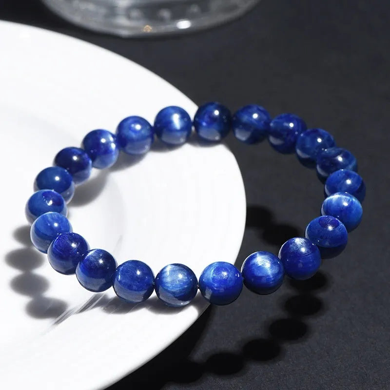 Natural blue crystal ball bracelet with geometric ruyi symbol design in polished 7A grade crystal