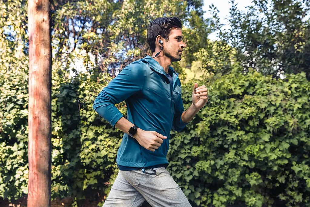 Black smart watch with heart rate monitoring on a silicone wrist strap
