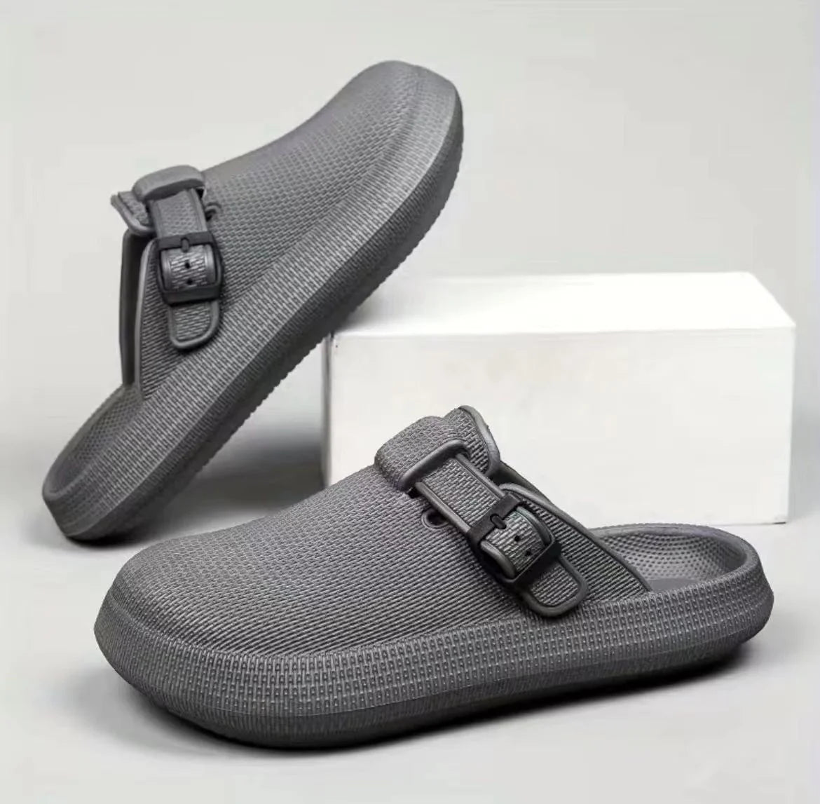 Lightweight EVA indoor home slippers in black, gray, and white