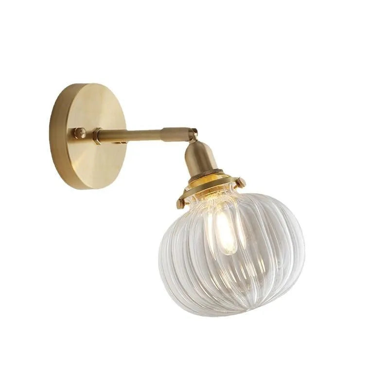 Pumpkin-shaped decorative glass wall lamp in water ripple transparent or solid blue finish.