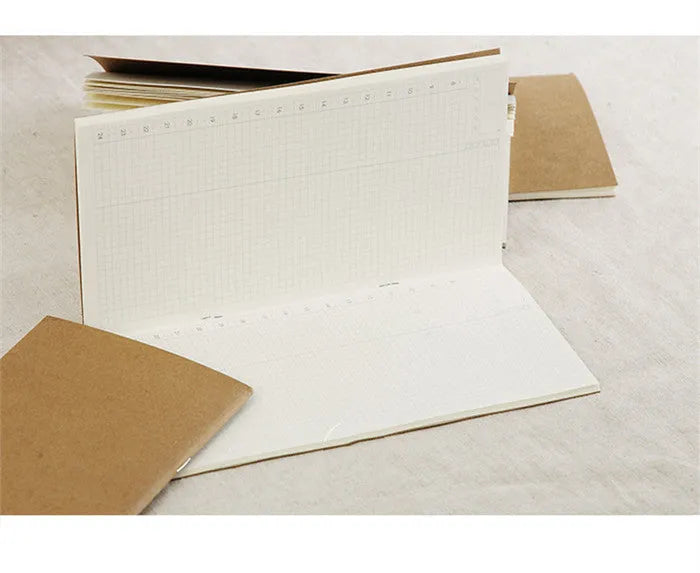 Travel cowhide diary refill inner core showing 11x21cm size and saddle stitch binding