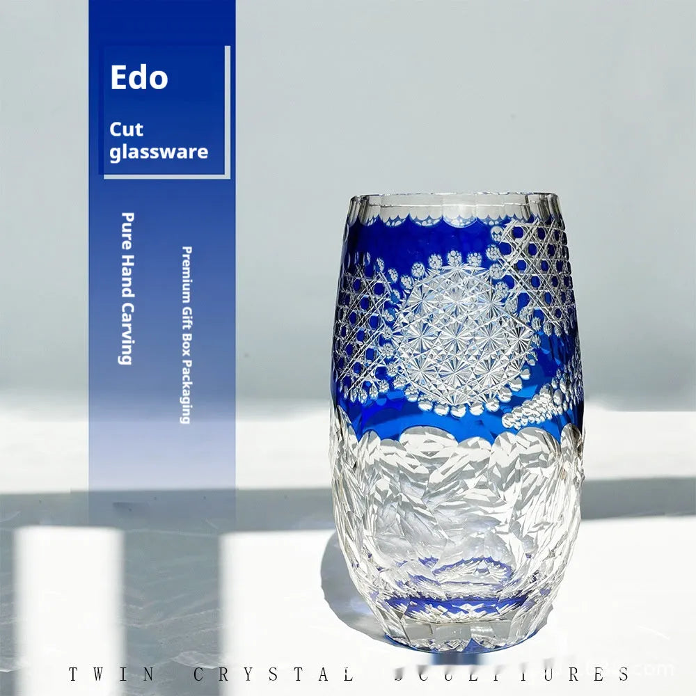 Blue Jianghu cut crystal glass tumbler 80x190mm on a table