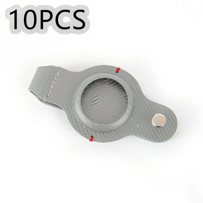 Black PU leather AirTag holder keychain with metal ring, 4cm diameter, secure snap fit for tracking valuables