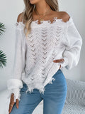 White cut-off shoulder pullover sweater with hollow-out detailing and long sleeves.