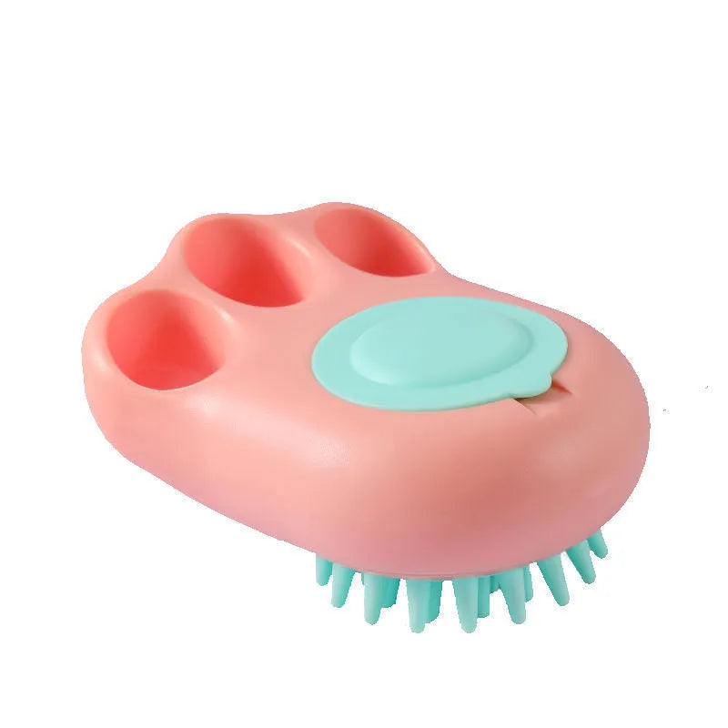 Cat claw-shaped silicone pet bath brush with suction cup base, shown in blue colour.