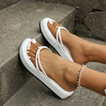 Thick sole flip-flops in herringbone pattern, available in six colours on a white background.