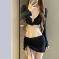 Women's long sleeve black and white bikini swimsuit with split bottoms for swimming