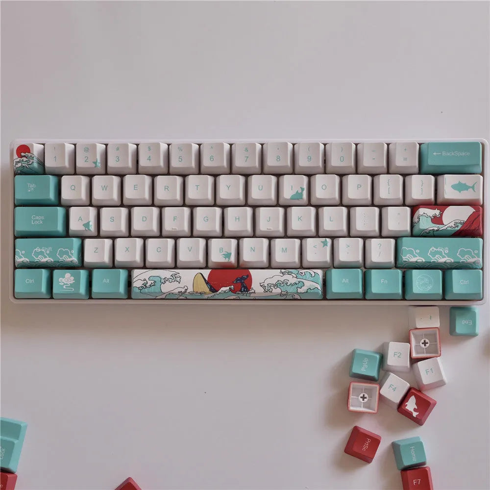Coral Sea themed PBT plastic keycap set for mechanical keyboards, showing 104 colourful keys.