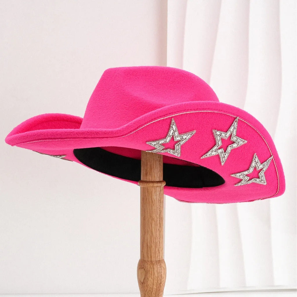 Beige woolen felt Western-style top hat with a conical crown and a silver hexagonal star decoration on the front.