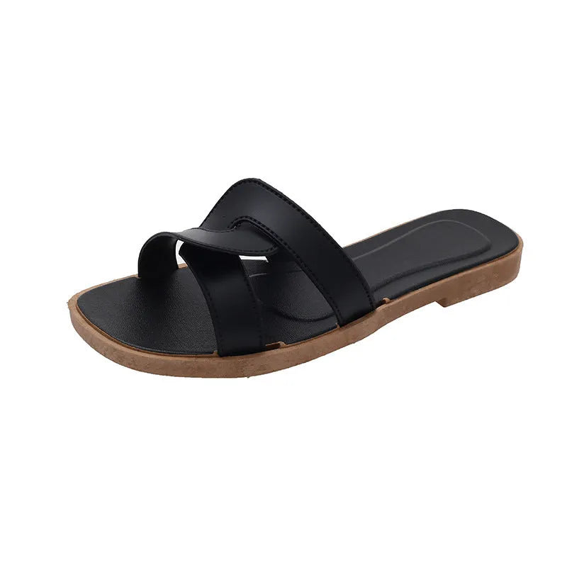 Women's PVC cross-strap flip-flop sandals in milky white, shown for home casual wear.