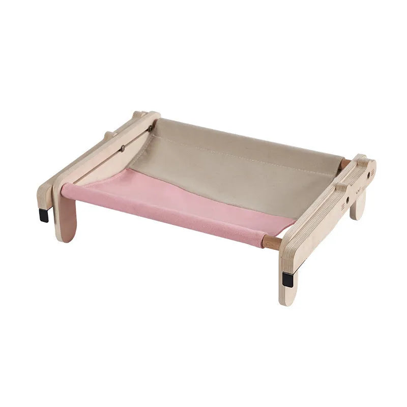 Solid wood raised pet bed with removable cushion in plaid pattern for cats and dogs