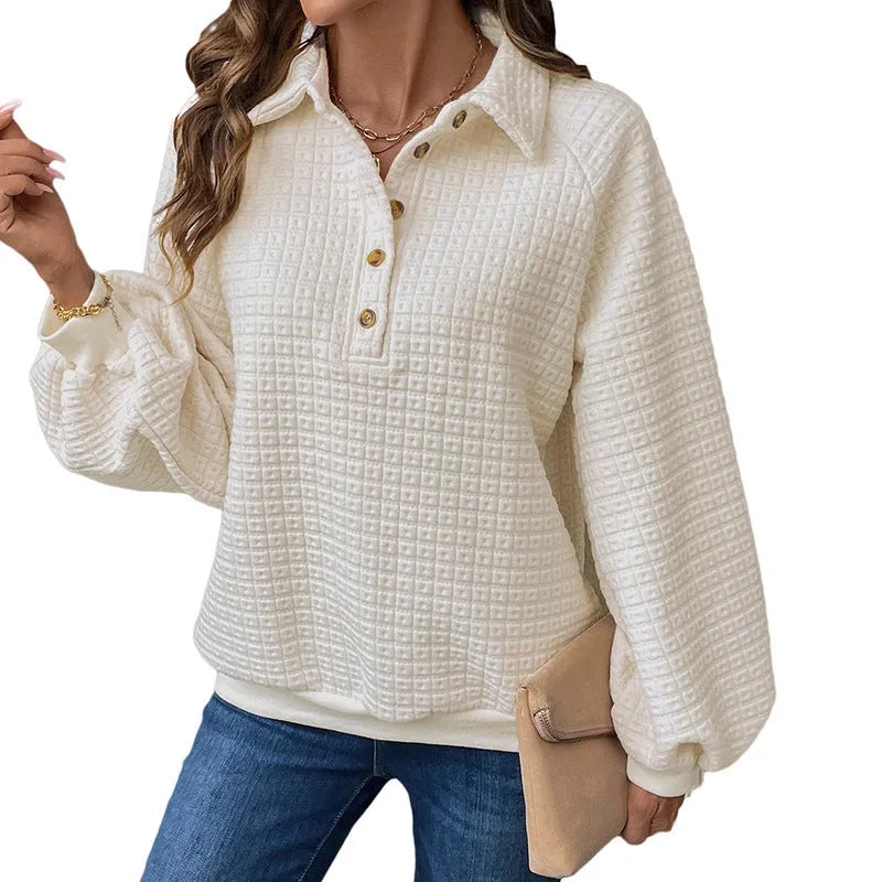 Women's textured polo collar solid colour sweater in beige on a hanger.