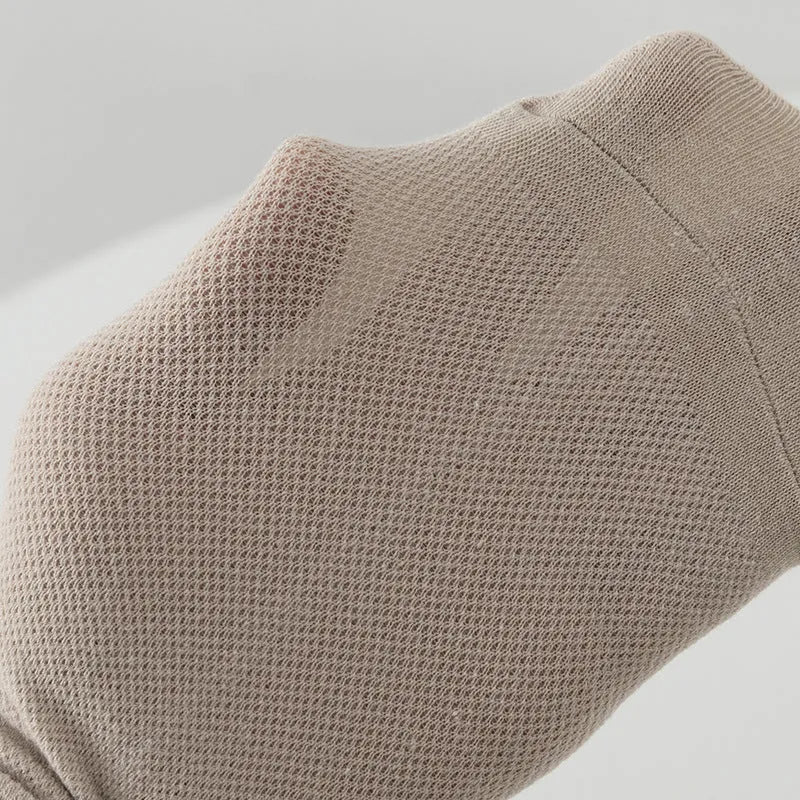 Pair of solid colour low-cut boat socks for men, made from breathable polyester.