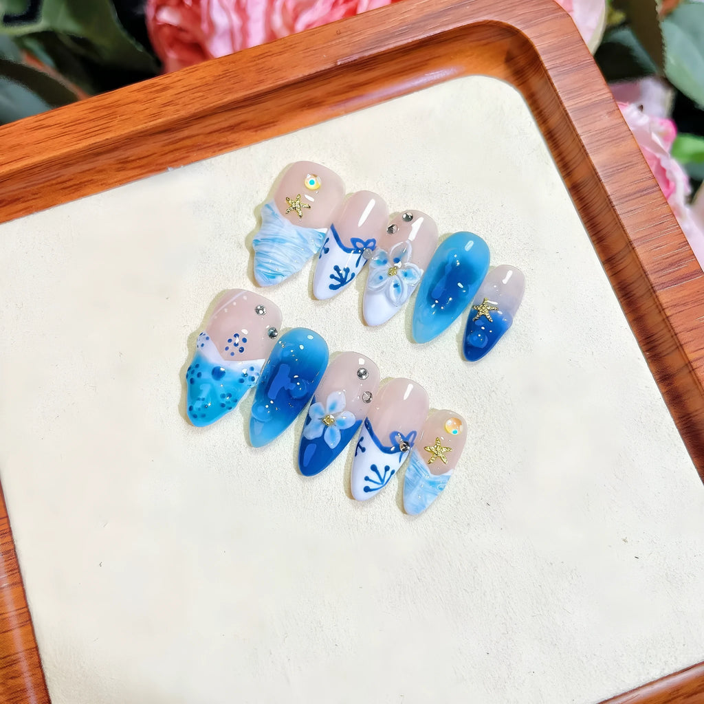 Blue hand-painted carved summer ice transparent false nails set in plastic wearable armour