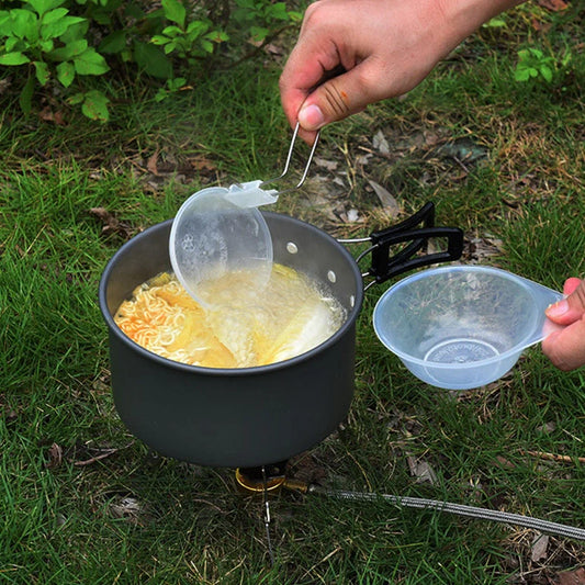 Green folding aluminium alloy camping pot set for 2-3 people showing compact storage size