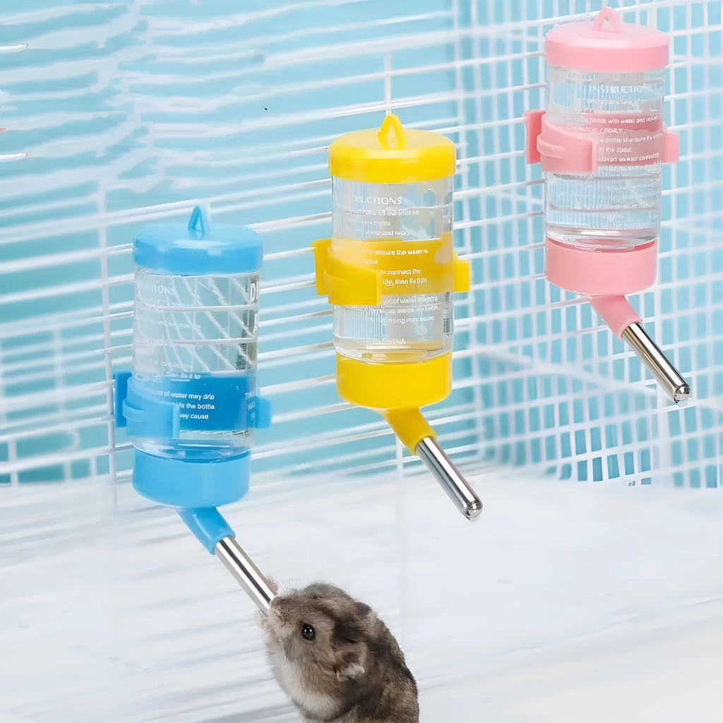 Plastic ball kettle leak-proof pet water feeder in green, showing its attachment to a bottle.