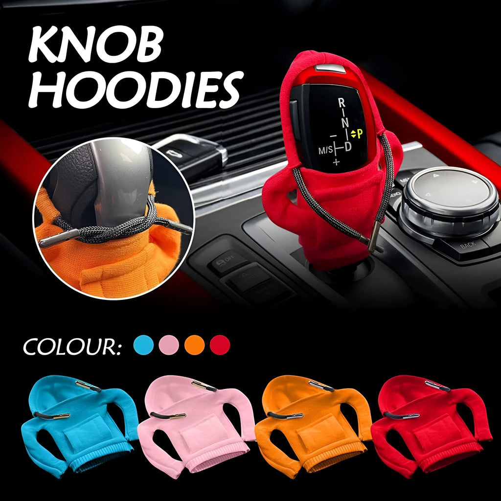 Blue cloth gear shift knob hoodie cover shown on a car gear lever.