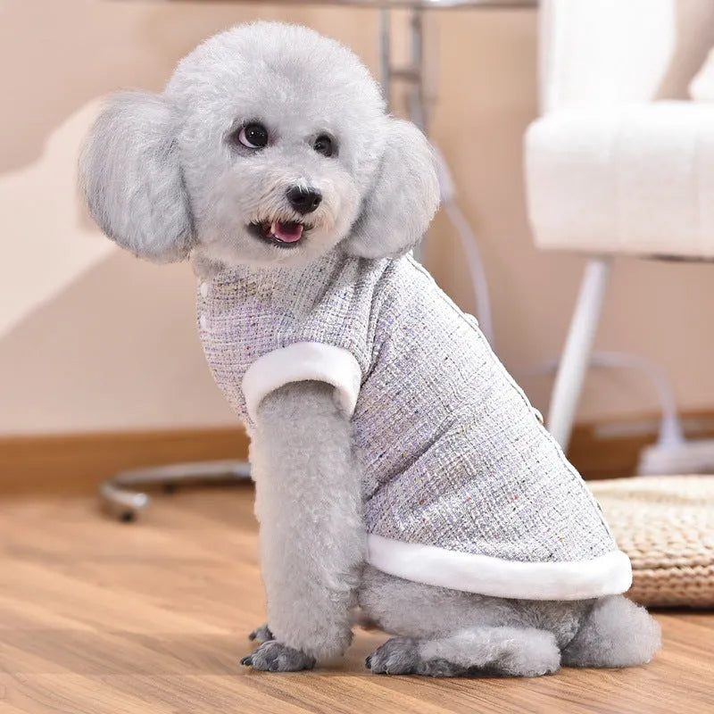 Black PU cat sausage jacket costume for dogs on hanger showing size range
