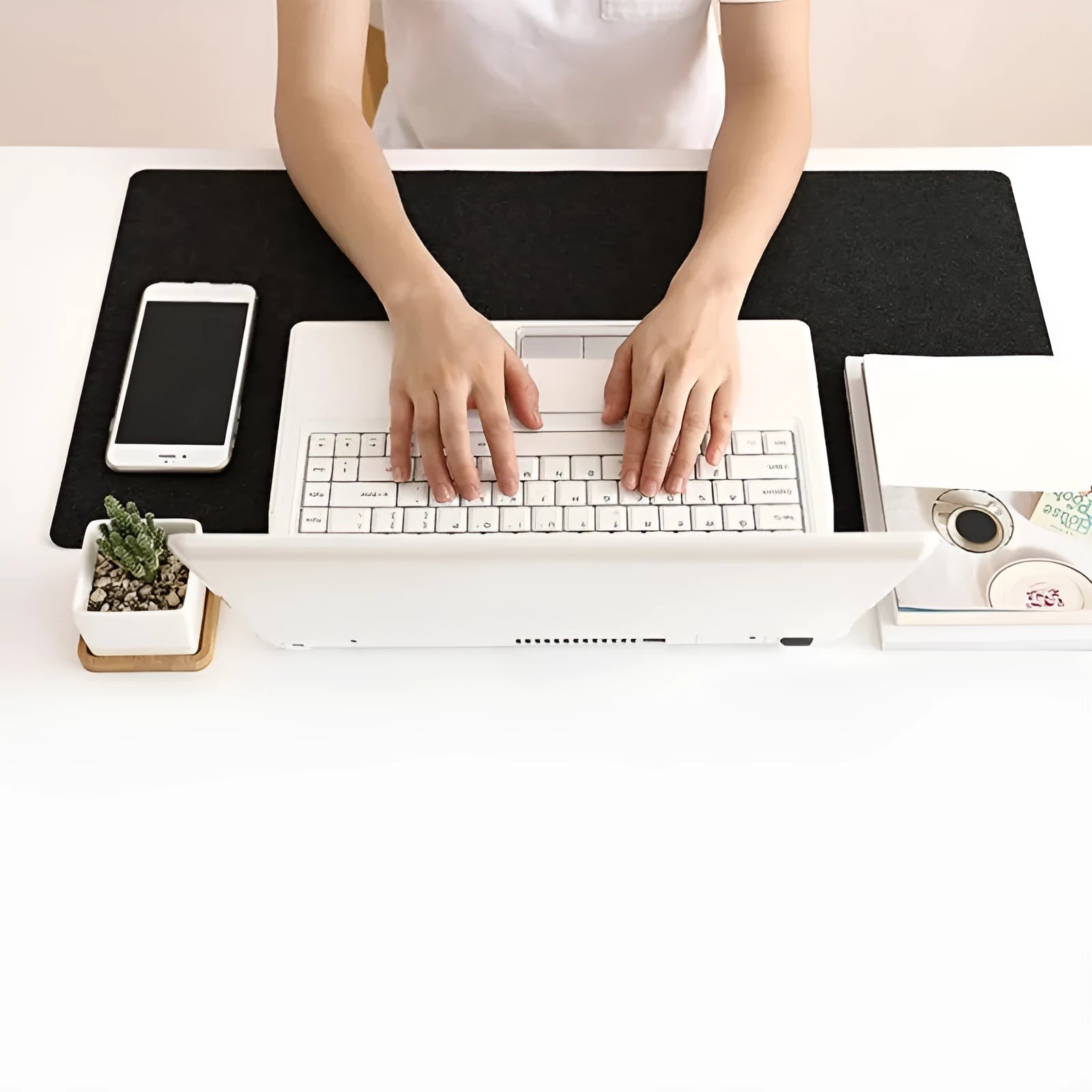 Large felt mouse pad in black on office desk with keyboard and mouse, 325x635mm