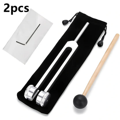 Silver 128 Hz weighted bio-acoustic tuning fork set with hammer, velvet pouch, and accessories for sound therapy