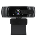 Black USB webcam with built-in microphone on a laptop screen, showing 360-degree rotation.