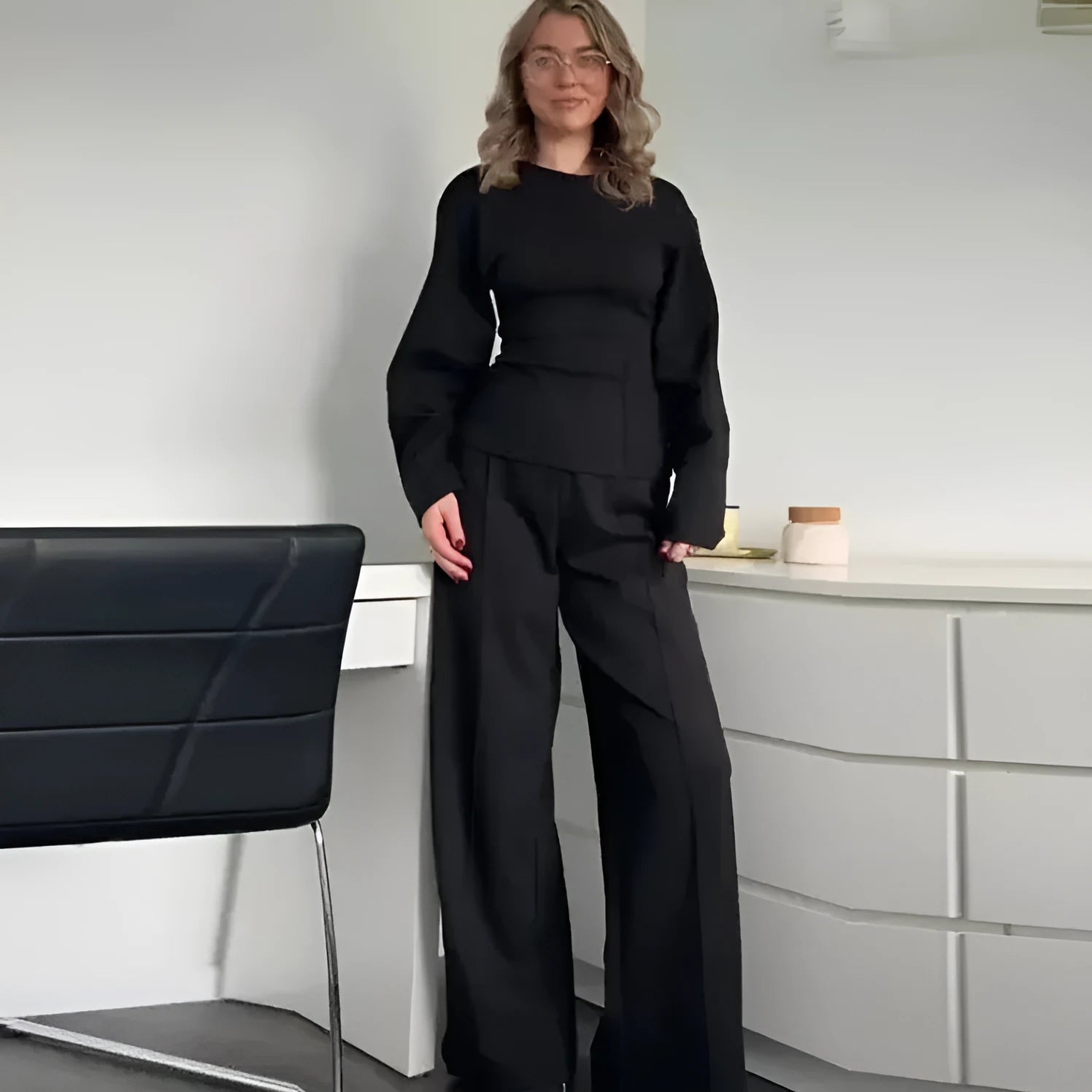 Women's apricot coloured polar fleece suit set featuring a pleated long sleeve top and wide leg trousers