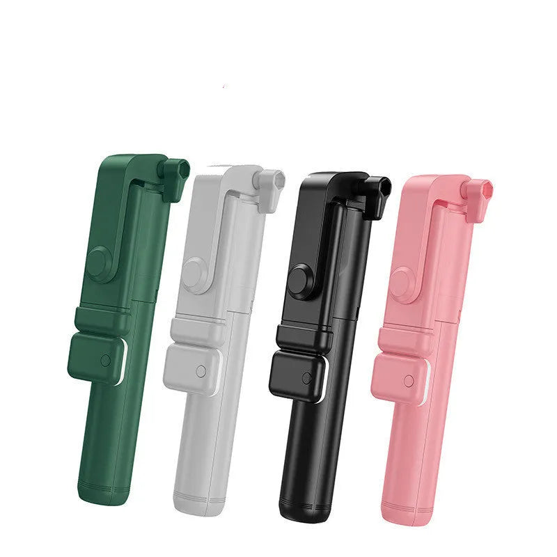 Black Bluetooth selfie stick tripod with fill light extended, holding a smartphone.