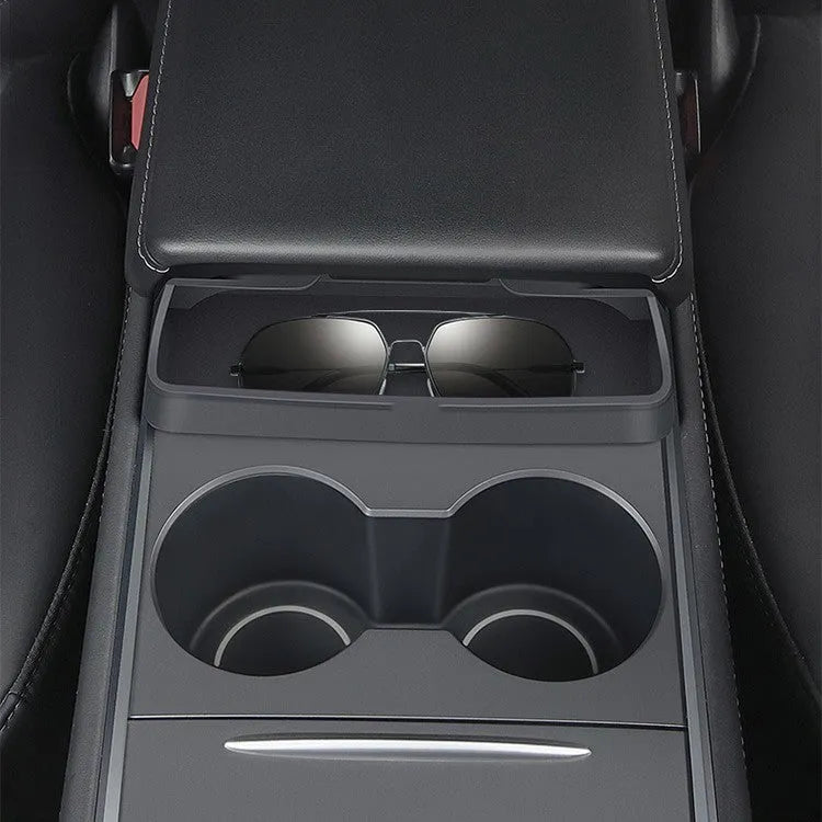 Black silicone glasses case mounted in Tesla Model 3/Y centre console