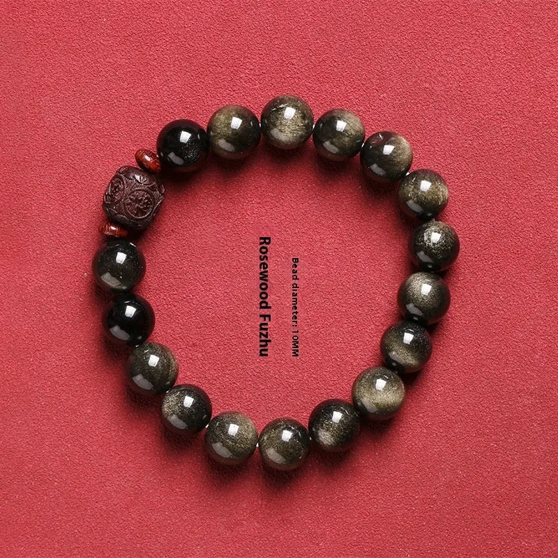 Hand-woven unisex bracelet with round 10mm golden obsidian beads in a vintage style.