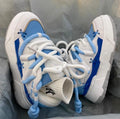 Women's grey retro chunky platform sneakers with thick rubber sole and front lacing