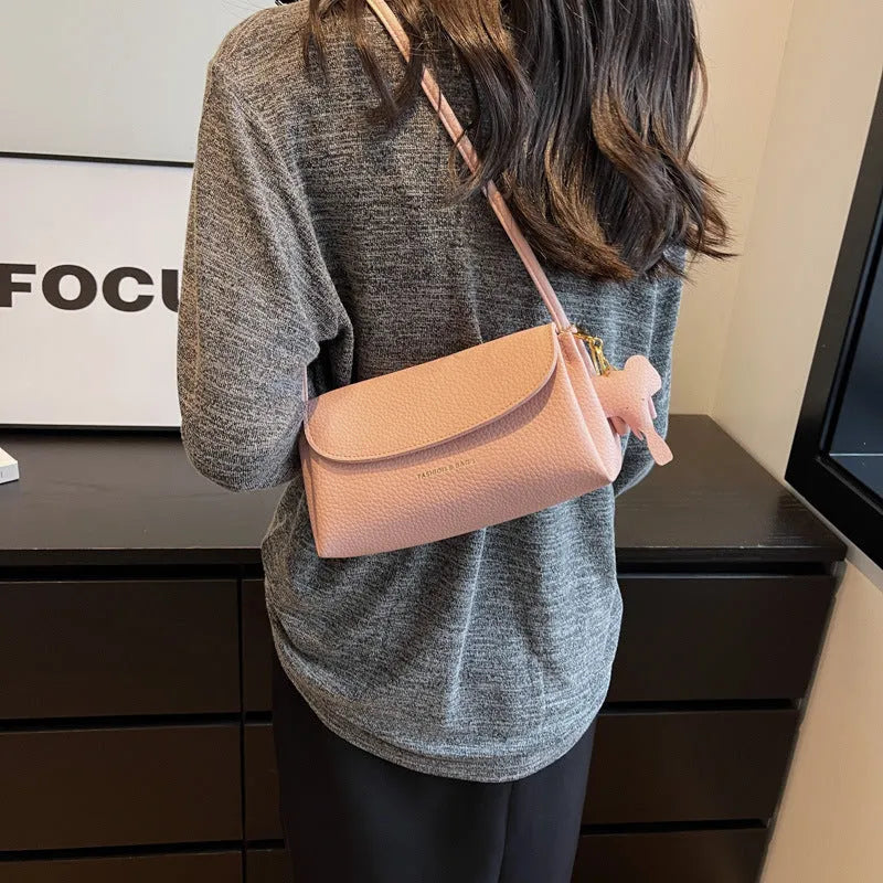 Soft PU leather small shoulder bag in khaki, pillow shape, 21cm width, with visible sewing thread details