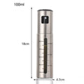 Stainless steel press-type oil injection bottle with 100ml capacity and glass body on kitchen counter