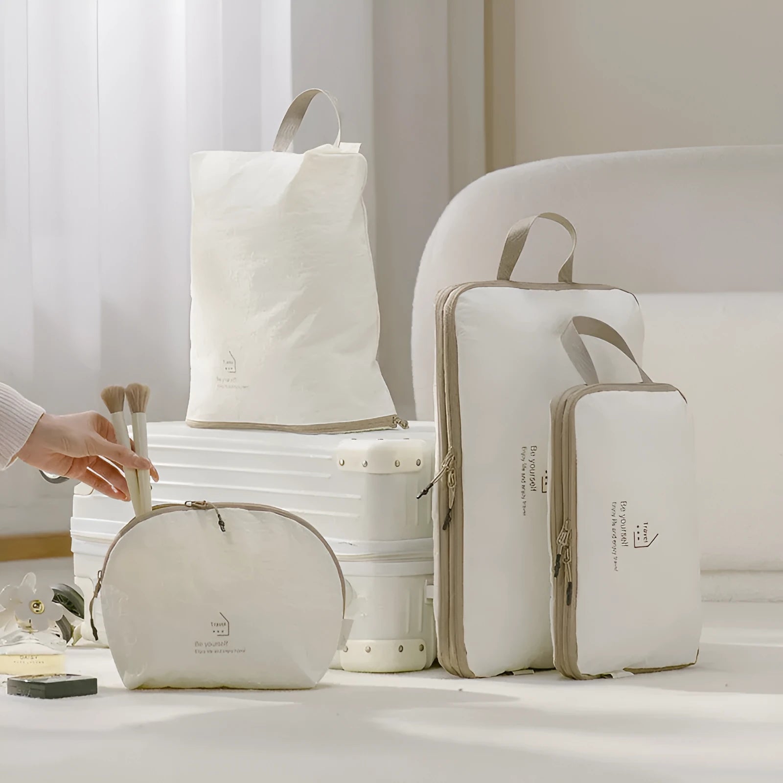 Taslon travel storage bag set with compression big bag, medium bag, shoe bag, and underwear bag for luggage organisation.