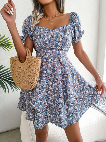 Stylish floral mini dress with ruffled hem, high waist, and short sleeves in various colors