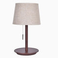 Walnut-coloured solid wood desk lamp with a white fabric lampshade and a black cord switch