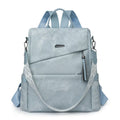 Women's PU leather national style contrast colour backpack with multiple pockets, available in beige, black, blue, dark brown, khaki, and light blue