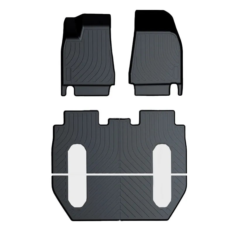 Rubber floor mat for Tesla car with TPE footrest section.