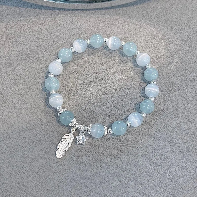 Korean style crystal bracelet with blue moonlight glass beads and eight pointed star charm