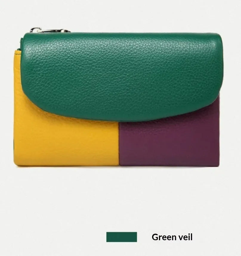 Women's short wallet with soft leather texture and stitching detail in solid colour, urban minimalist style