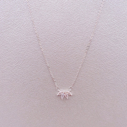 Minimalist lotus flower petal necklace in gold and silver, perfect for parties and everyday wear