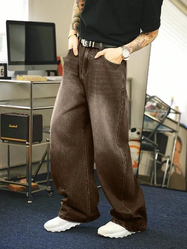 Men's brown washed loose flared jeans with low waist and zipper fly, side view