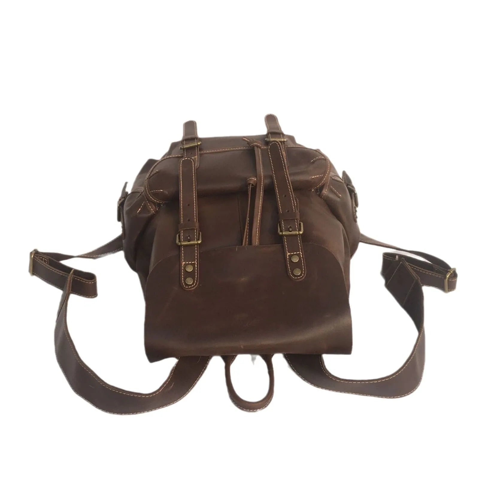 Brown men's leather backpack with an air pillow belt on the straps.